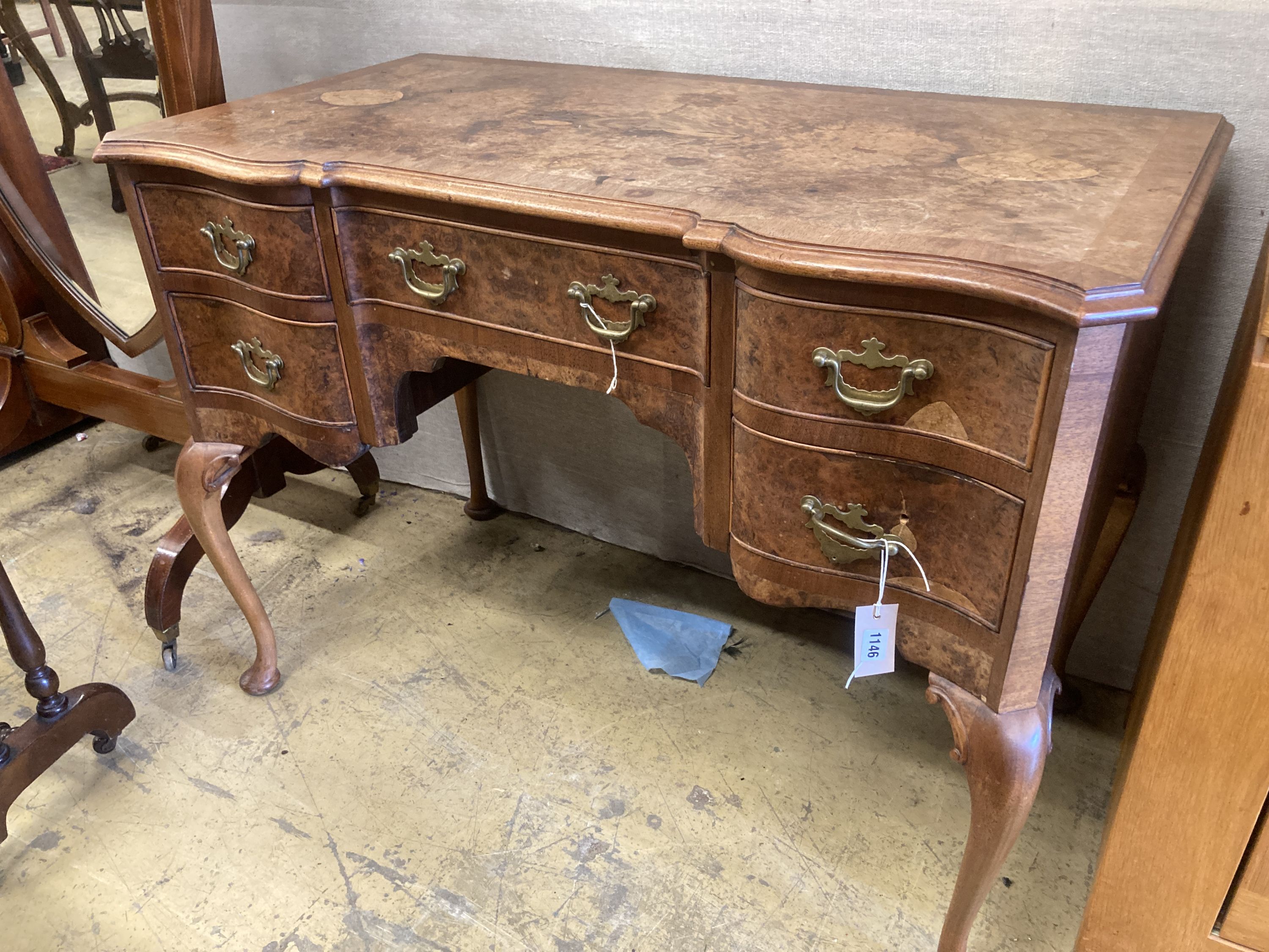 A Queen Anne revival mahogany and walnut breakfront serpentine side table, width 106cm, depth 55cm, height 78cm